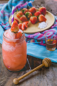 High angle view of fruits in glass on table