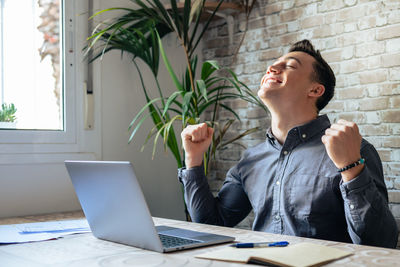 Young businessman working at office