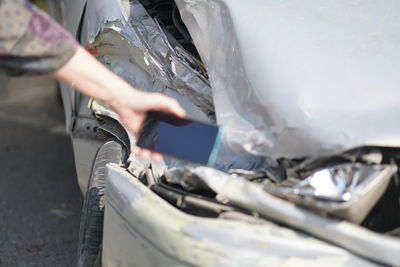 Close-up of man driving car