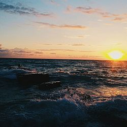 Scenic view of sea against sky during sunset