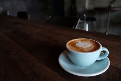 Coffee cup on table