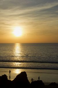 Scenic view of sea at sunset