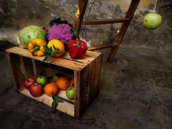 High angle view of fruits in basket on table