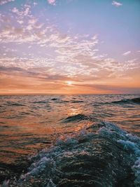 Scenic view of sea against sky during sunset