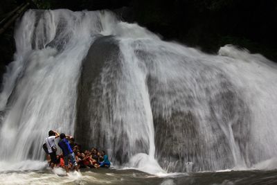 Man enjoying waterfall