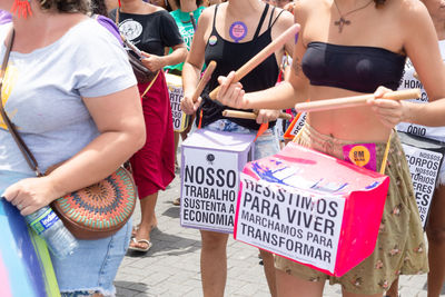 People protesting in defense of women's rights.