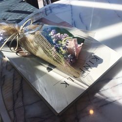 High angle view of bouquet on table