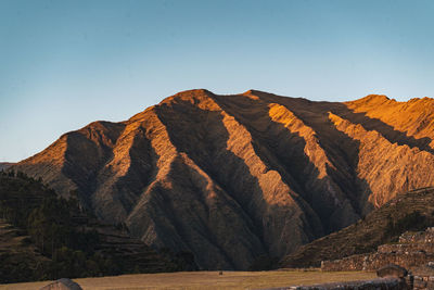 Scenic view of mountains against clear sky