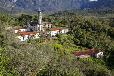 High angle view of townscape against mountain