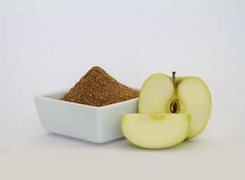Close-up of apple against white background