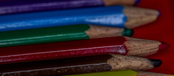 Close-up of colored pencils on table