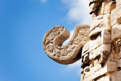 Low angle view of statue against sky