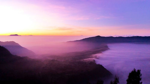 Scenic view of mountains at sunset