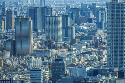 High angle view of modern buildings in city