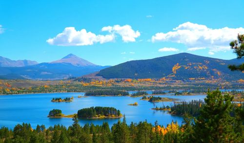 Scenic view of lake with mountains in background