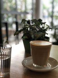 Close-up of coffee cup on table