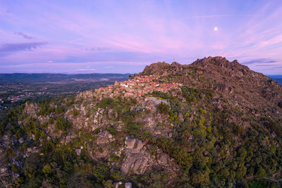 Drone aerial panorama view of monsanto historic village at sunset, in portugal