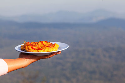 Person holding food