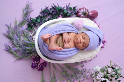 New born baby boy photo shoot in lavender colour theme