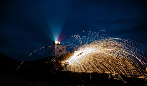 Firework display at night