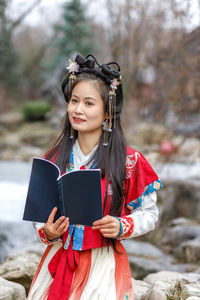 Young woman using mobile phone
