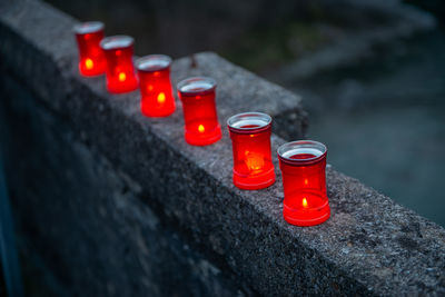 Candles lit to illuminate the path of travellers