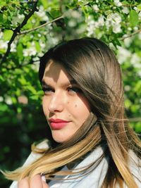 Close-up of young woman looking away