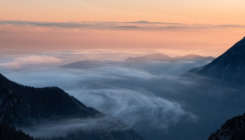 Scenic view of mountains against sky during sunset