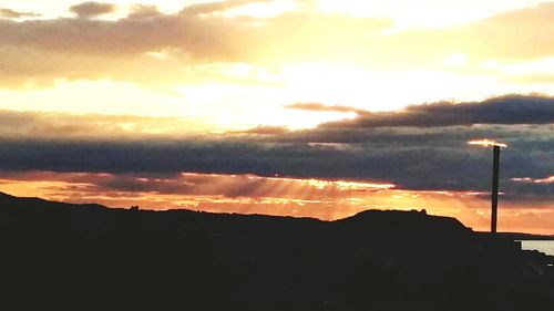 Scenic view of dramatic sky during sunset