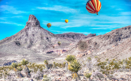 Hot air balloons against sky