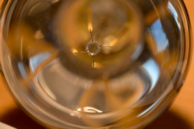 High angle view of glass jar on water