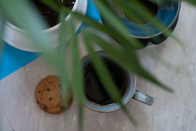 High angle view of coffee cup on table