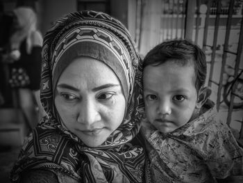 Close-up of mother with son outdoors