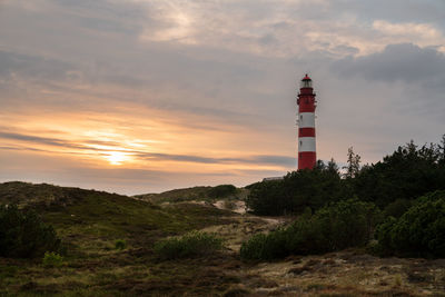 Panoramic image of the wittduen lighthouse at sunset, amrum, germany