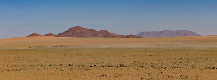 Scenic view of desert against sky