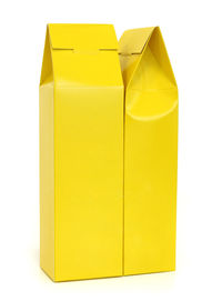 Close-up of yellow box over white background