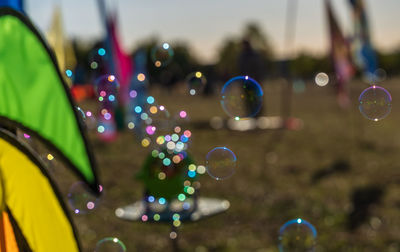 Close-up of bubbles against blurred background