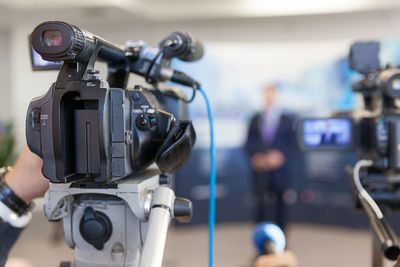 Close-up of man photographing