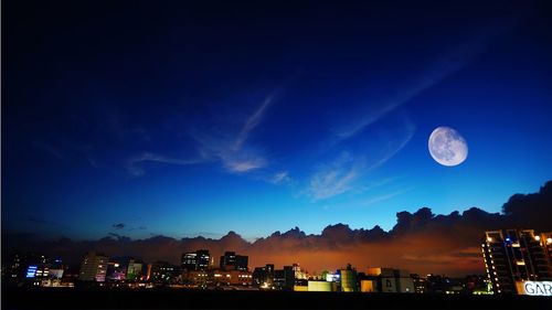 Illuminated cityscape at night
