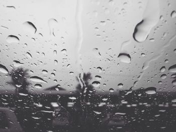 Close-up of water drops on glass