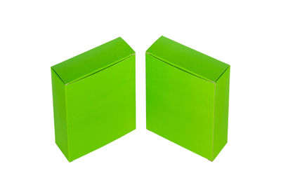 Close-up of green paper against white background