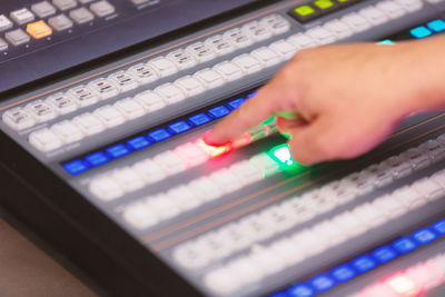 Cropped image of man using sound mixer 