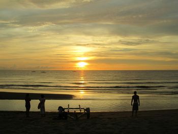 Scenic view of sea at sunset