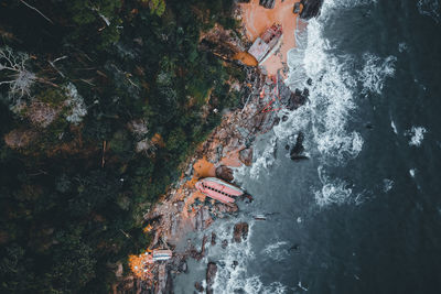 High angle view of woman by sea
