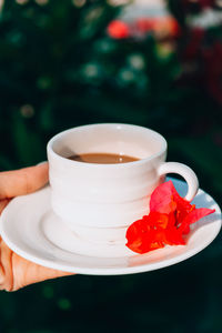 Close-up of coffee cup on table