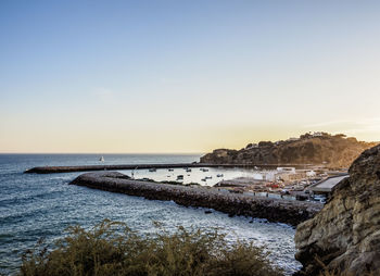 Scenic view of sea against sky during sunset