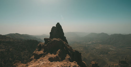 Panoramic view of rock formations against sky