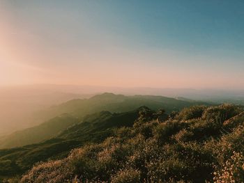 Scenic view of landscape against sky during sunset