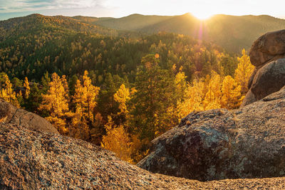 Scenic view of mountains against sky during sunset