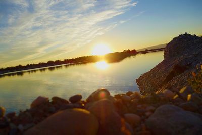 Scenic view of sea at sunset